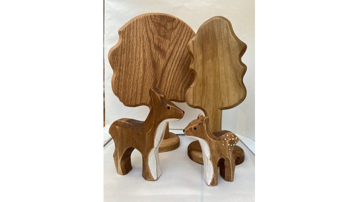 Doe and fawn carved in wood